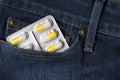 Blister of pills in jeans pocket Royalty Free Stock Photo