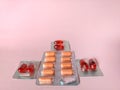 Blister of pills on pink background. medical concept