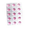 Blister of pink prescription pills over isolated white background Royalty Free Stock Photo