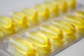 Blister with yellow gel pills Royalty Free Stock Photo