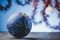 Bllue Christmas ball on a blue light background Royalty Free Stock Photo