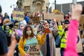 BLM protesters wear PPE Face Masks and hold homemade signs at a Black Lives Matter protest in Richmond, North Yorkshire