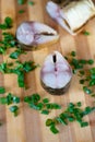 Bloater and green onion on the board Royalty Free Stock Photo