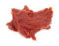 Blob of tomato paste on a white background