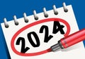 Calendar concept with the year 2024 written on a notepad. Royalty Free Stock Photo