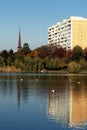 Block of flats and church with reflection Royalty Free Stock Photo