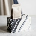 Block of black and white marble, showcasing a striking pattern of Royalty Free Stock Photo