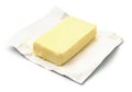 Block butter in open wrapping Royalty Free Stock Photo