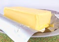 Block of butter on silver wrapper Royalty Free Stock Photo