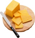 Block of cheese on cutting board with a knife Royalty Free Stock Photo