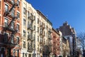 Block of colorful old buildings with clear blue sky background in the Upper East Side of Manhattan in New York City Royalty Free Stock Photo