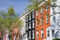 Block of colorful row houses on Macdougal Street in New York City