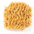 A block of dried Instant noodles on white