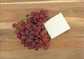 Block of feta cheese with fresh grapes Royalty Free Stock Photo