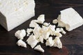 Crumbling a Block of Feta Cheese Royalty Free Stock Photo