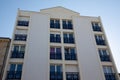 Block of flats modern white contemporary residential new building with window balcony