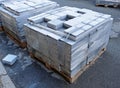 A block of granite cobblestones prepared for the renovation of the pavement of a pedestrian street in the city Royalty Free Stock Photo