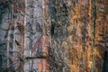 Block of granite with veins of iron ore Royalty Free Stock Photo