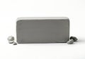 Block of gray modeling clay with small pieces on a white background {Ai generated Royalty Free Stock Photo