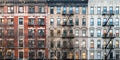 Block of historic apartment buildings on Eldridge street in the Lower East Side neighborhood of Manhattan in New York City Royalty Free Stock Photo