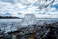 Block of ice on lake on early spring day Royalty Free Stock Photo