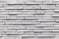 Pattern of white stone cladding wall tile texture and seamless background