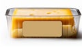 block of processed cheese in plastic container Royalty Free Stock Photo