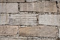 Block retaining wall made of big granite stones