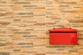 Block stone wall background and post box