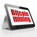 Blockchain concept: Tablet Computer with Bitcoin Mining on display Royalty Free Stock Photo