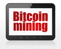 Blockchain concept: Tablet Pc Computer with Bitcoin Mining on display Royalty Free Stock Photo