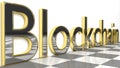 Blockchain sign in gold and glossy letters on a white background and a checkerboard pattern floor