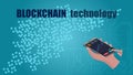 Blockchain technology text and smartphone with bitcoin graph in hand.