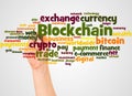 Blockchain word cloud and hand with marker concept Royalty Free Stock Photo