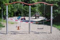 Blocked swing, closed public children`s playground,coronavirus lockdown Royalty Free Stock Photo