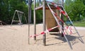 Blocked, closed public children`s playground due to coronavirus lockdown, good copy space