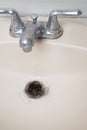 Blocked drain hole in sink Royalty Free Stock Photo