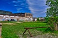 Blocked driveway to an Abandoned factory building with broken windows in lake mills WI