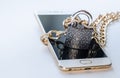 Blocked smartphone. The smartphone is chained and locked, as a symbol of private access to software