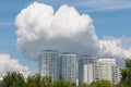 Blocks of flats under big white cloud Royalty Free Stock Photo