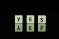 blocks with letters set on a glass table. Words arranged from le Royalty Free Stock Photo