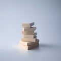 Blocks lined up in a row with natural wood texture