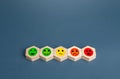 Blocks with mood faces gradations from happy to angry. Concept of rating, review. Visitor satisfaction with the services received Royalty Free Stock Photo
