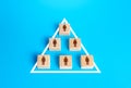 Blocks of people figurine are united into one structure organization. Combining efforts to achieve goal. Business team formation