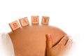 Blocks on pregnant belly Royalty Free Stock Photo