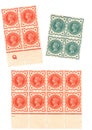 Blocks of vintage halfpenny postage stamps featuring a portrait of Queen Victoria. Royalty Free Stock Photo