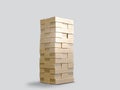 Blocks wood game jenga on gray background.