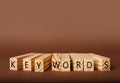 Blocks with word KEYWORDS on brown background Royalty Free Stock Photo