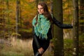 Blog style pretty young woman on a walk in forest on late autumn Royalty Free Stock Photo