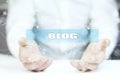 Blog text on screen on man hand Royalty Free Stock Photo
